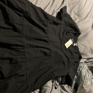 New never worn! Black dress with pockets, very flown and adorable.